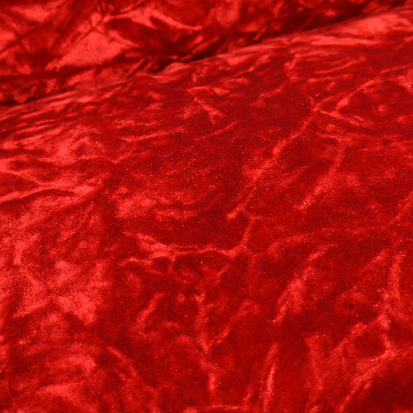 赤いベロア張りの1人掛けソファ