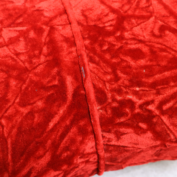 赤いベロア張りのコーナーソファ