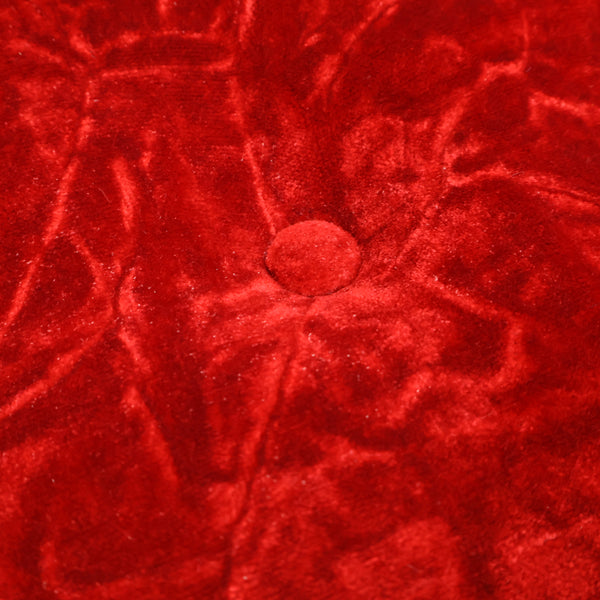 赤いベロア張りの1人掛けソファ