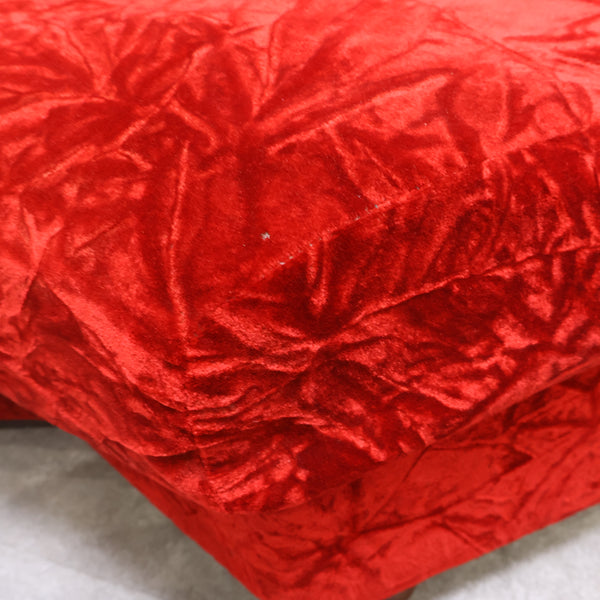 赤いベロア張りのコーナーソファ