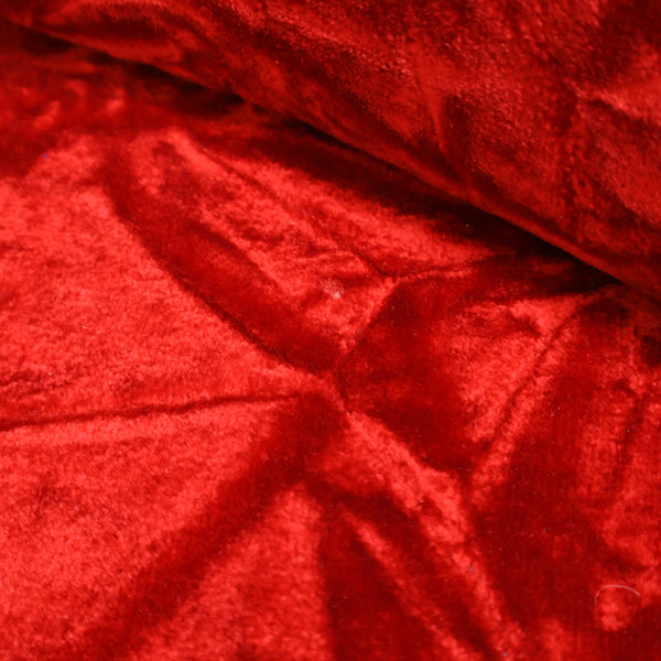 赤いベロア張りのコーナーソファ