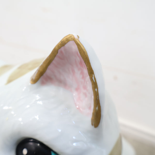 「お願いネコ」の貯金箱